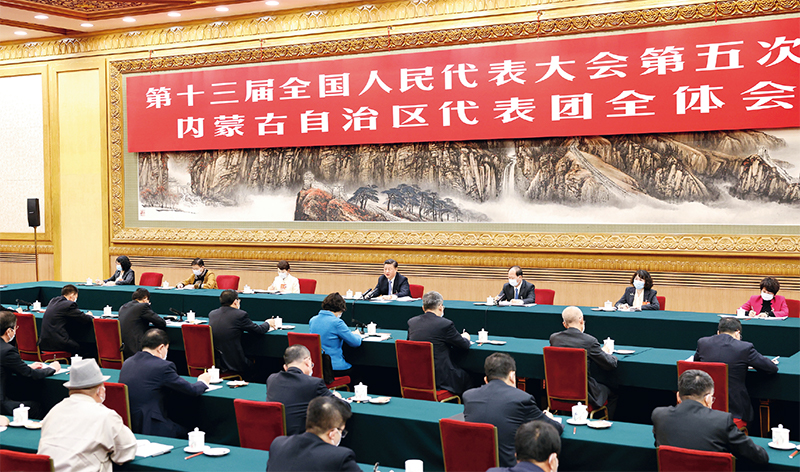 习近平：新时代党和人民奋进的必由之路